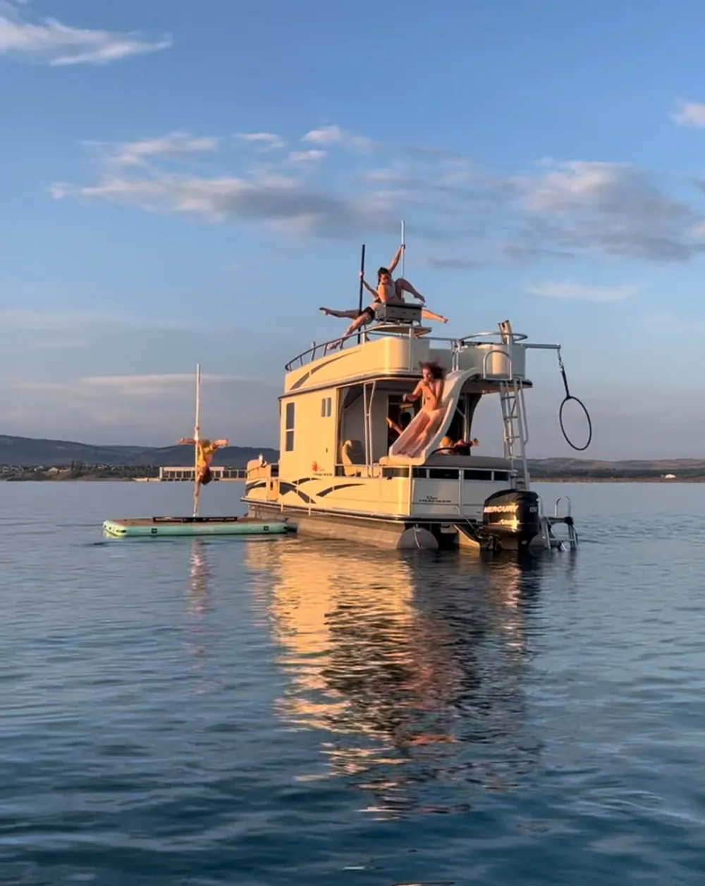 The boat at golden hour, mirrored in still water
